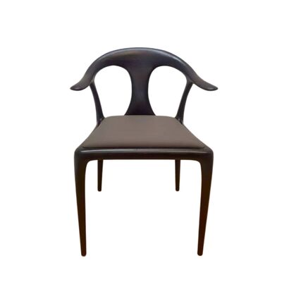 Sculptural Ash Wood Dining Chair with Dynamic Lines and Tufted Leather Seat for Restaurants and Homes